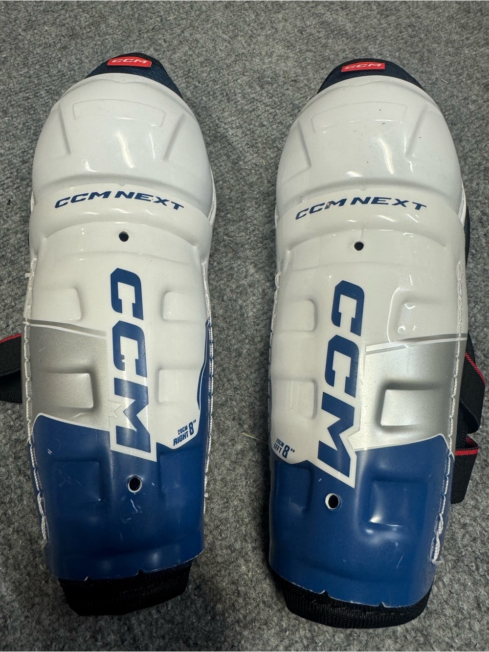 CCM Red and Black Youth Hockey Shin Guards